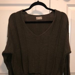 Knitted green sweater